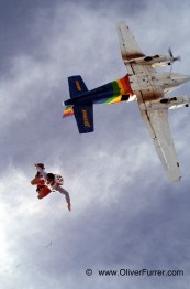 skateboard skydive jump over Hawaii