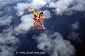 skateboard skydive jump over Hawaii