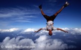freefly skydive with flippers over Hawaii