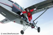 Skysurfer exiting the aircraft on his board